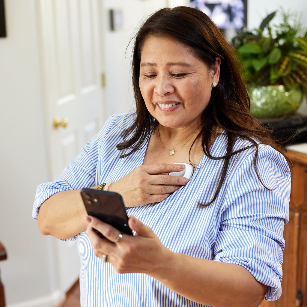 Patient at home using Coala Heart Monitor
